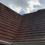 Roof heavily covered with moss beautifully cleaned