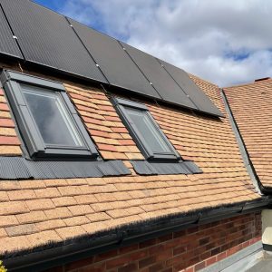 Full cleaned dormer roof with solar panels