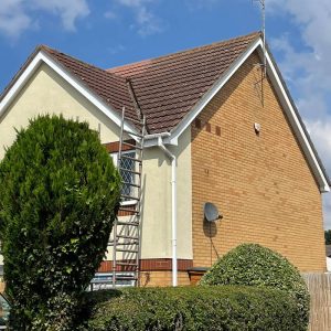 Modern house roof cleaning started and scaffolding tower for safe roof cleaning