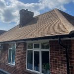 Moss, lichen and dirt removed from bungalow roof