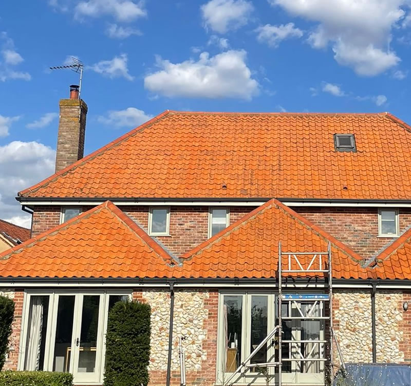 After roof has been steam cleaned looking amazing with colour returned