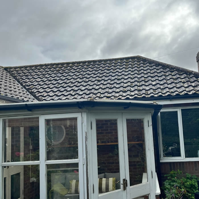 Dirty roof on rear of bungalow